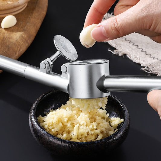 Prensa de ajo de acero inoxidable, trituradora de ajo manual, trituradora de ali
