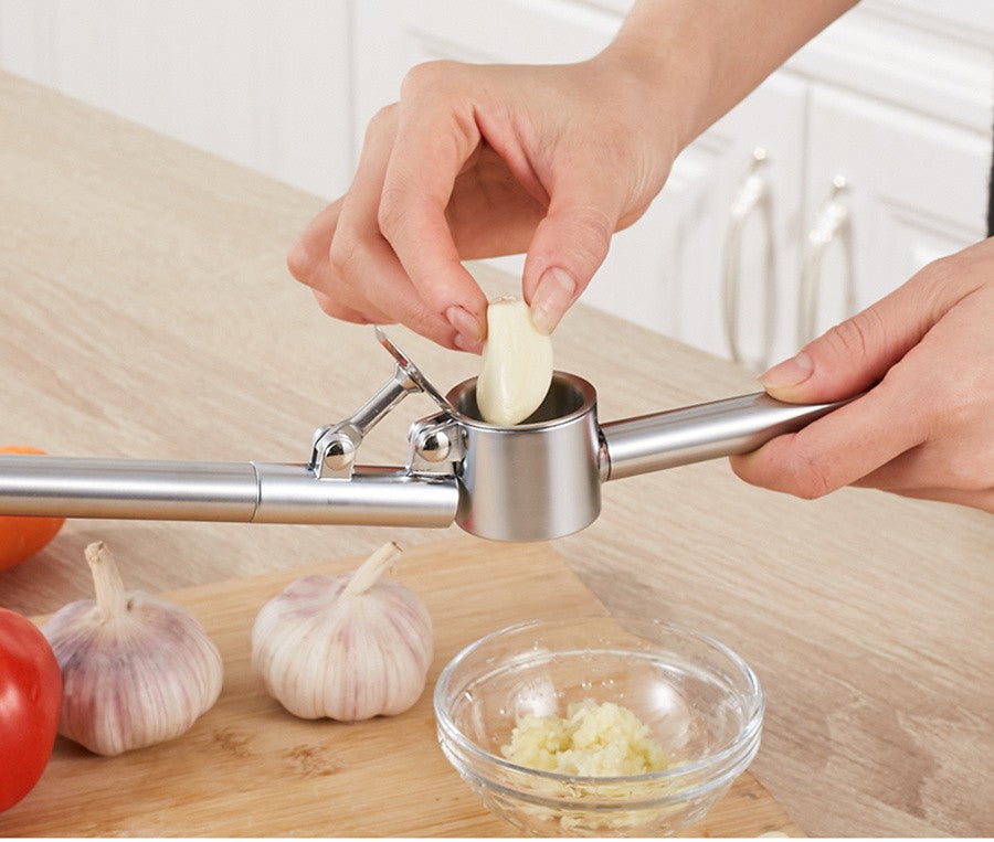 Prensa de ajo de acero inoxidable, trituradora de ajo manual, trituradora de ali